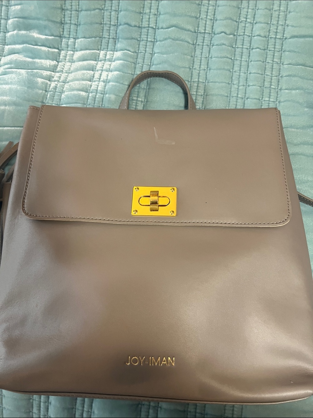 Joy Iman Taupe LeatherTote Backpack with Gold-Tone Turnlock.